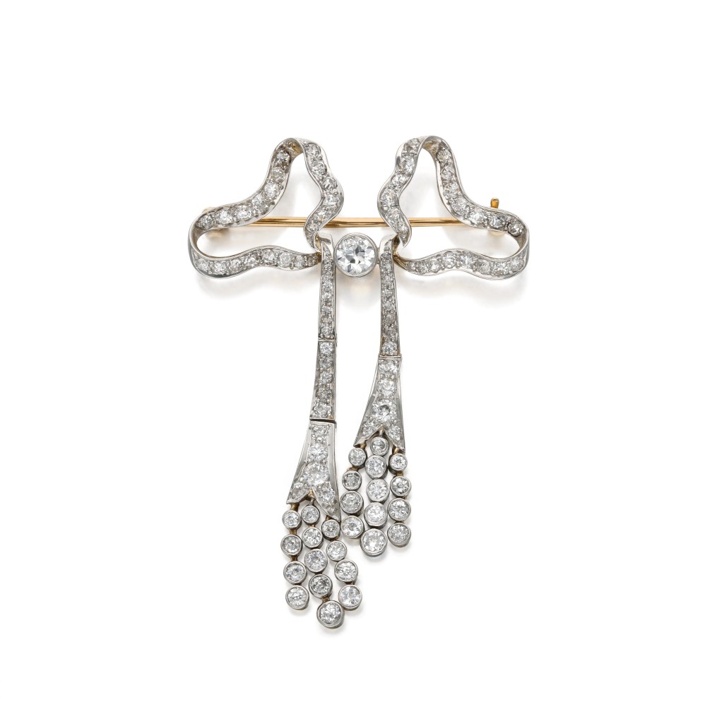 105-platinumgoldanddiamondbowpinbrooch.jpg