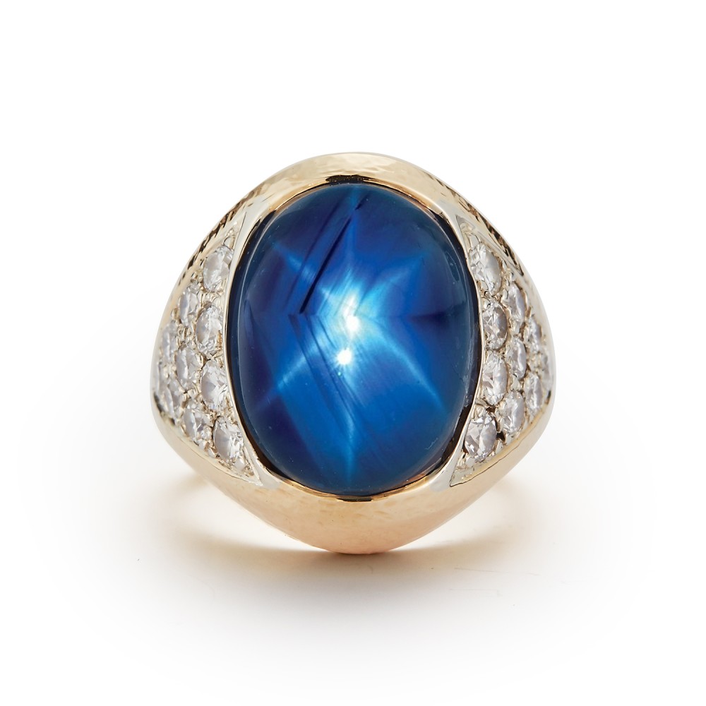 1622-davidwebbyellowgoldplatinumceylonstarsapphirediamondring.jpg