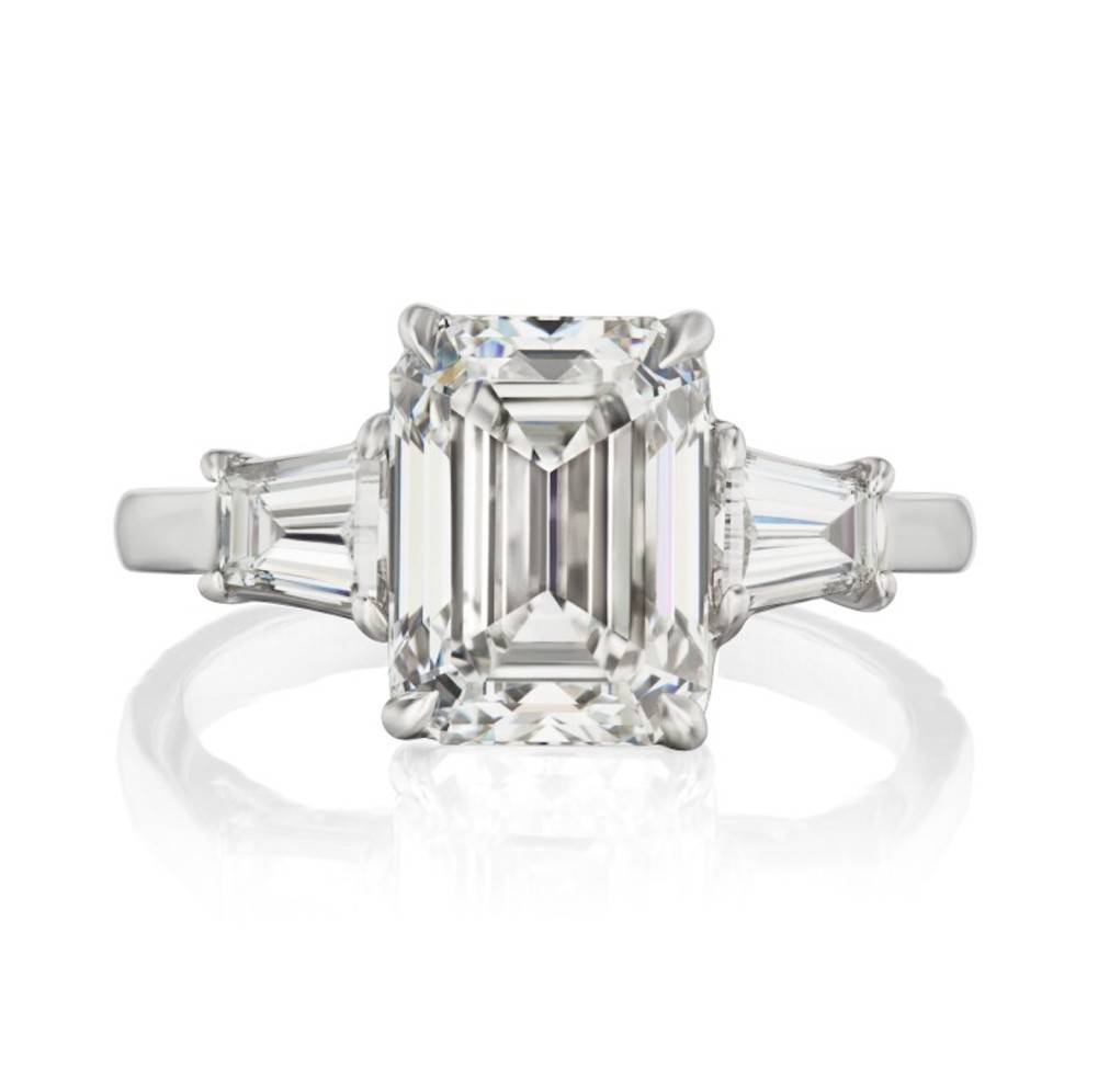264-platinum-and-2.70ct-emerald-cut-diamond-three-stone-engagement-ring.jpg