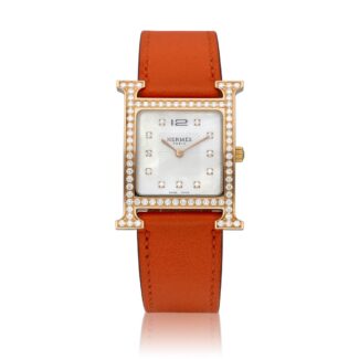 Heure H Reference HH1.571, a rose gold quartz wristwatch with strap