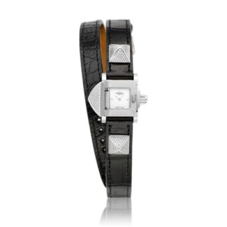 Medor Reference ME2.130, a stainless steel and diamond-set wristwatch with concealed dial